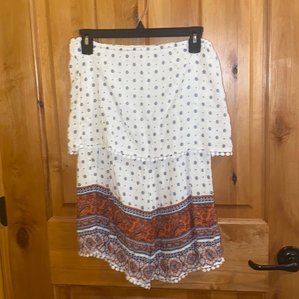 Short sleeveless white romper